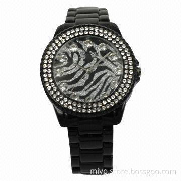 Ladies' fashion watch with stones on case and glitter on dial, fancy, stylish and nice